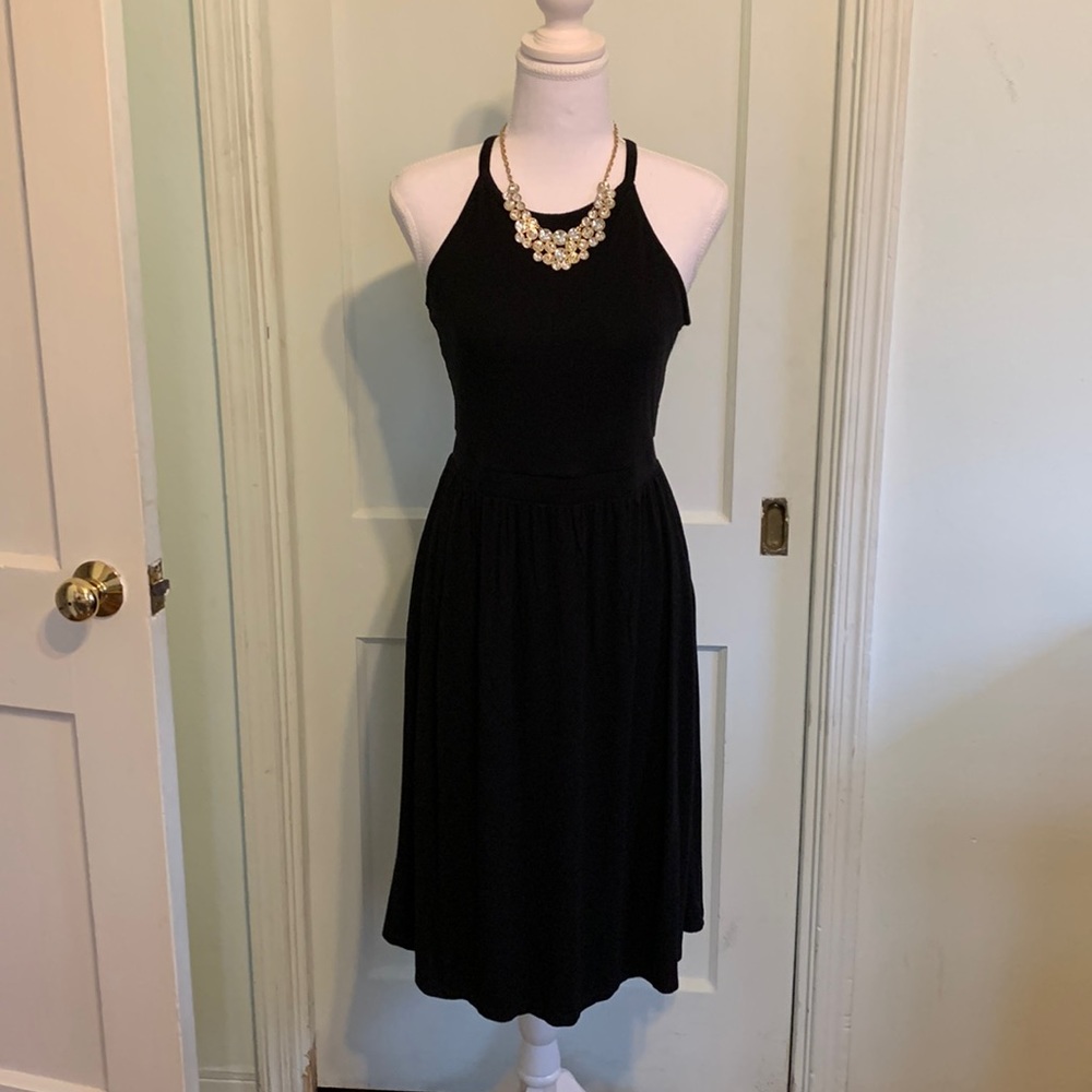 Old Navy used black halter dress. Size medium and hits me below the knee.